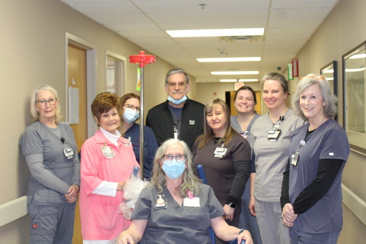 Hospital auxiliary volunteers donate fourth transport chair to Hillcrest Claremore